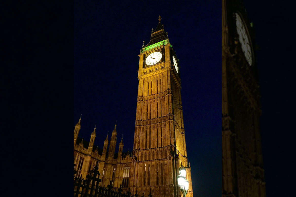 A nighttime view of the Elizabeth Tower in London, England, home of the famed clock bell Big Ben.