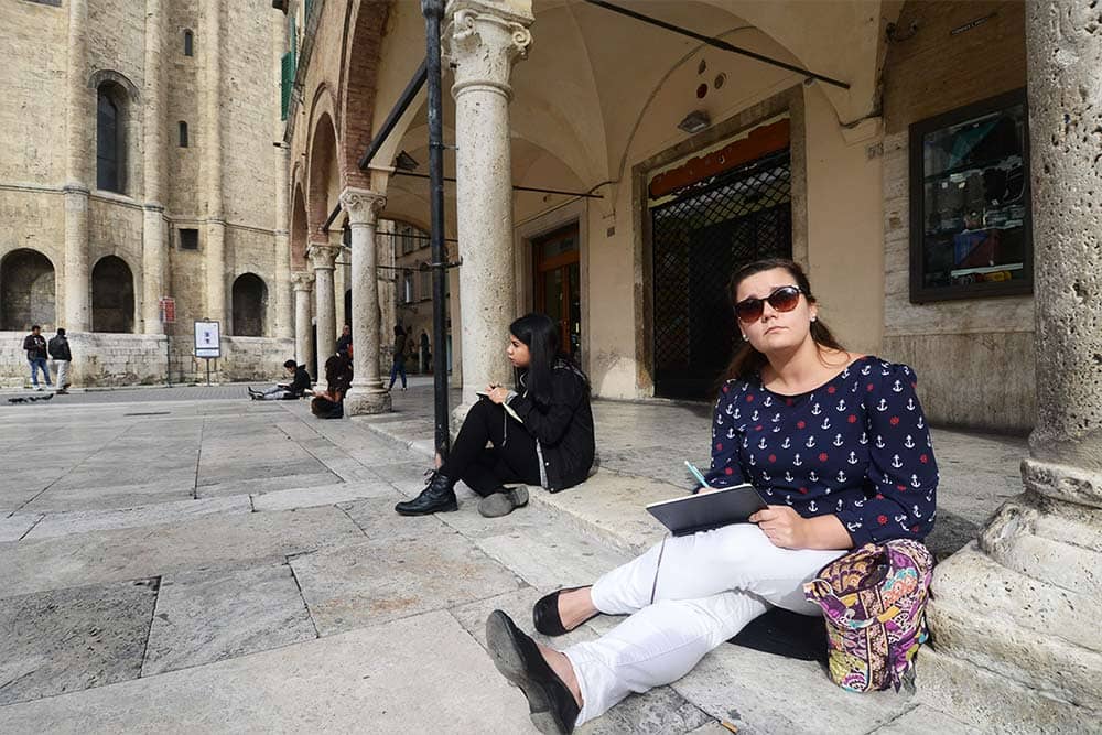 Students sketch buildings in Urbino, Italy, during the College of Engineering’s first study abroad trip, in partnership with Tuscany's University of Urbino.