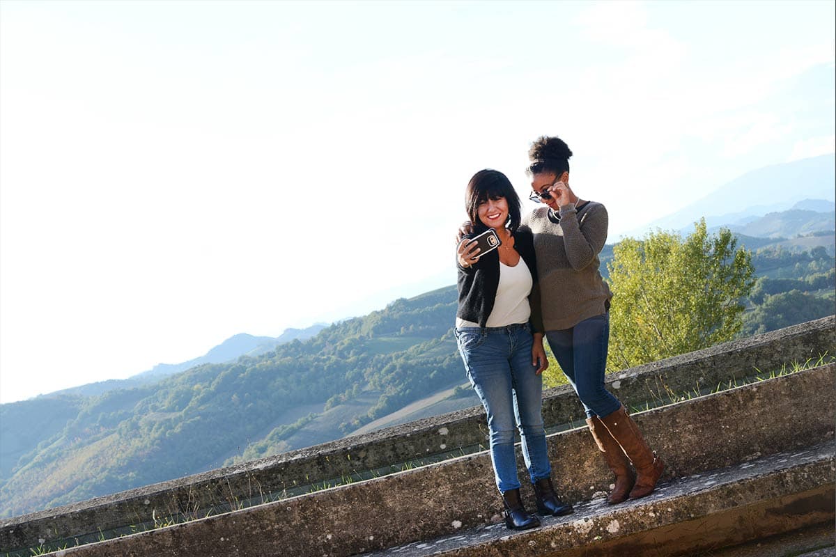 Civil engineering students Carla Martinez and Chelsea Linwood take a selfie with Tuscan hills behind them during the College of Engineering's first visit to Urbino, Italy, and the University of Urbino. Martinez became UTSA’s first undocumented student to be able to study abroad after federal protections were enacted by the Obama administration.