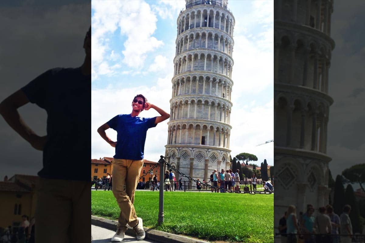 UTSA Top Scholar and biology major Bharath Ram joins the other tourists in taking a cheesy photo at the Leaning Tower in Pisa, Italy.