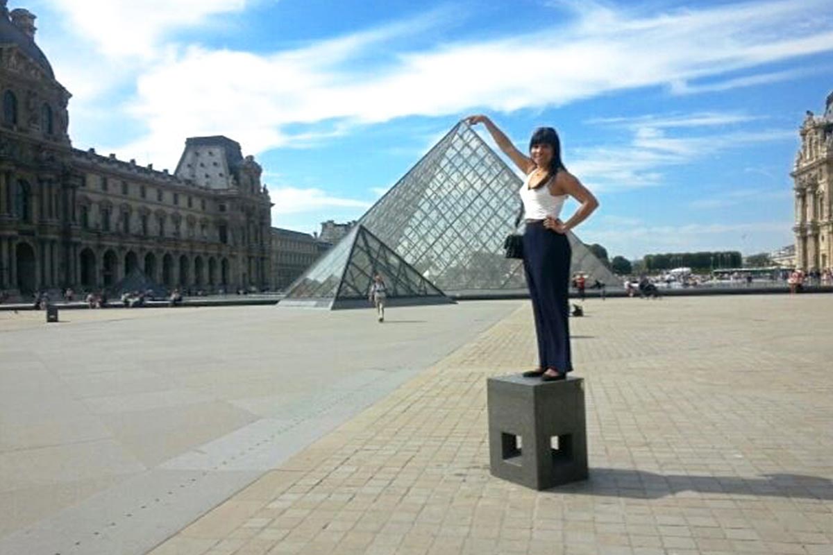 Salma Mendez Gomez '16 has some fun outside the Louvre Museum in Paris, France.