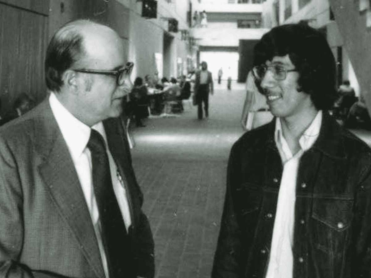 President Flawn gives Gino Chincarini, UTSA’s first freshman student, a tour around campus on June 2, 1976.