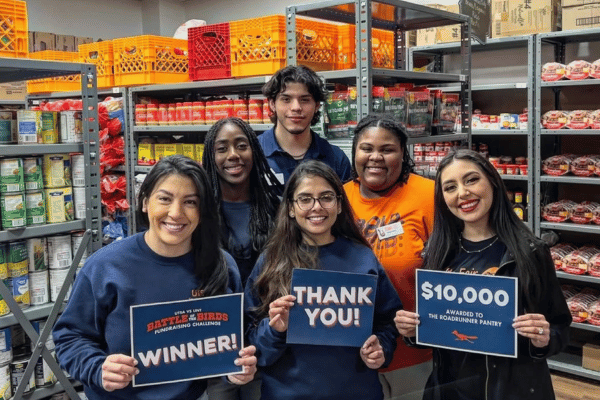 group of student celebrating Huddle Against Hunger in 2023