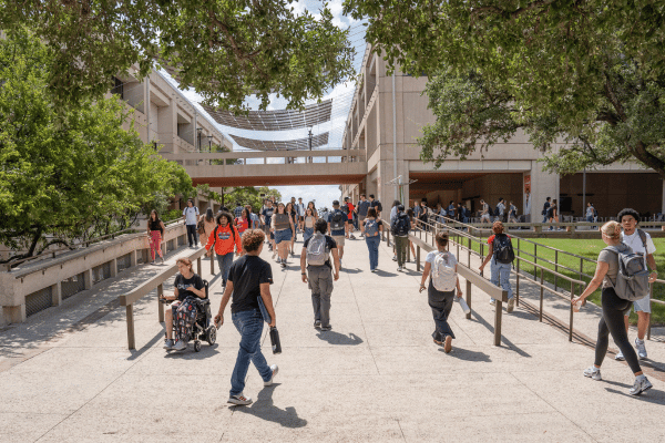 students walking along a ramp in the Central Plaza