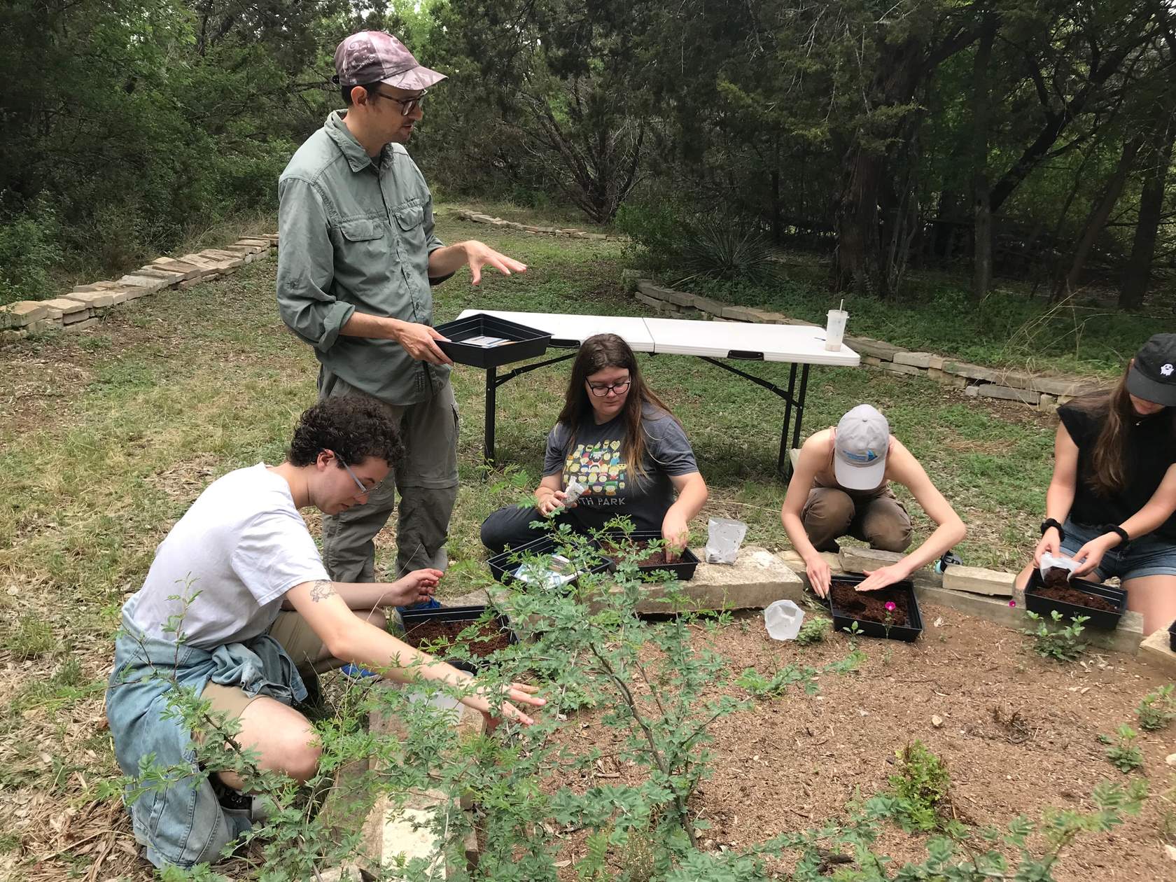 Dr. Brigham and students at the Bioswale