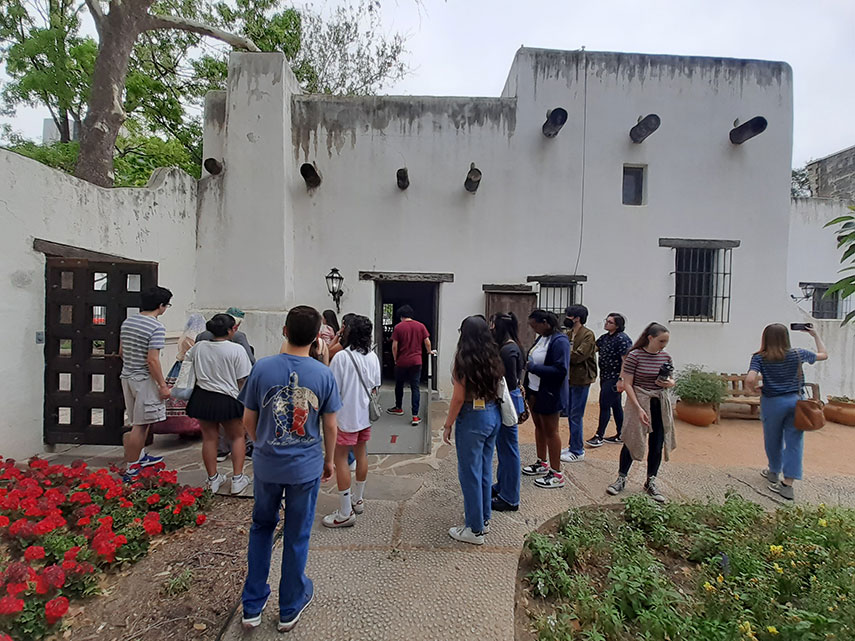 Dr. Rushforth and students at a San Antonio museum