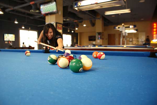 Student Shooting Pool