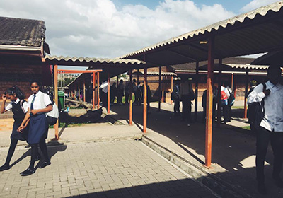 South Africa students outside their school.