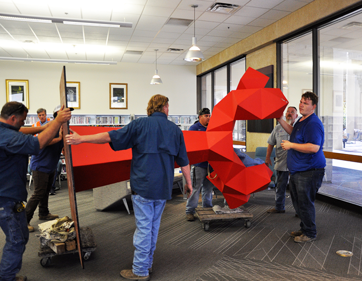 A Sebastian sculpture is placed in John Peace Library